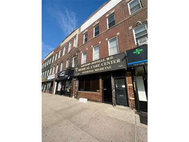 This versatile mixed-use property is strategically positioned on - photo 1
