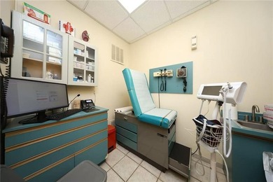 This versatile mixed-use property is strategically positioned on - photo 3