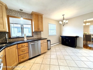 6 OVER 6, LARGE HOUSE, FINISHED BASEMENT. ABOVE GROUND LEVEL ON - photo 7