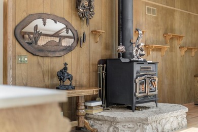 Unique property tucked away on a private wooded lot in a quiet - photo 12
