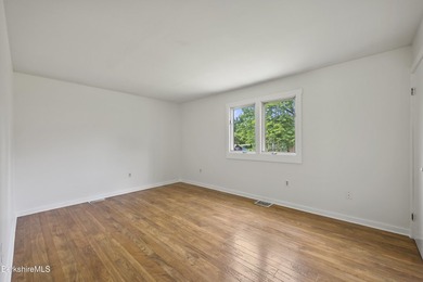 Enjoy easy Berkshire living in this spacious end-unit condo at - photo 17