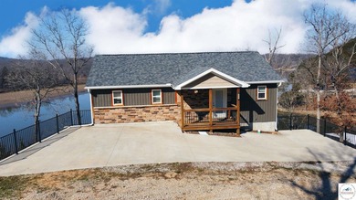 This 3-bedroom, 2.5-bath lakefront home offers over 2,000 square - photo 4