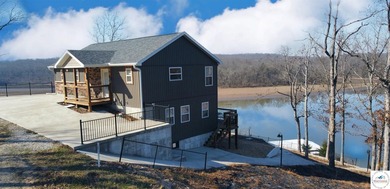 This 3-bedroom, 2.5-bath lakefront home offers over 2,000 square - photo 5