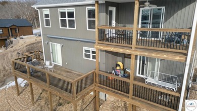 This 3-bedroom, 2.5-bath lakefront home offers over 2,000 square - photo 8