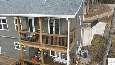 This 3-bedroom, 2.5-bath lakefront home offers over 2,000 square - photo 9