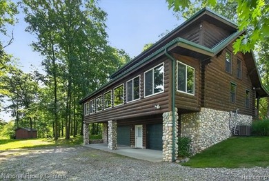 Welcome to this meticulously maintained 2,400 sq. ft. log home - photo 31
