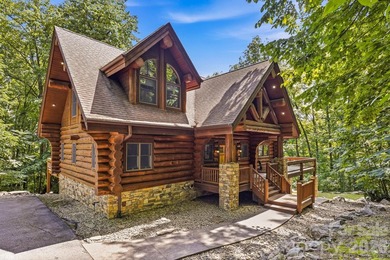 Stunning custom log home nestled on over 3 acres in the shadow - photo 2