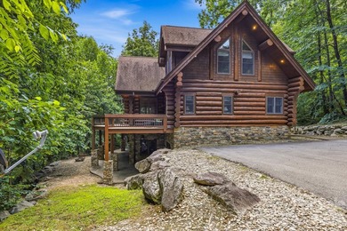 Stunning custom log home nestled on over 3 acres in the shadow - photo 3