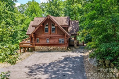 Stunning custom log home nestled on over 3 acres in the shadow - photo 4