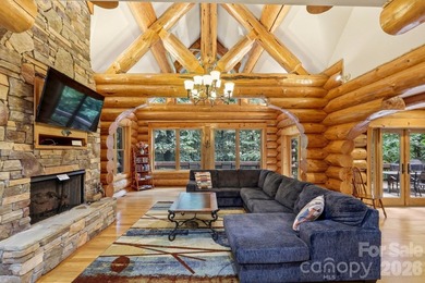 Stunning custom log home nestled on over 3 acres in the shadow - photo 7
