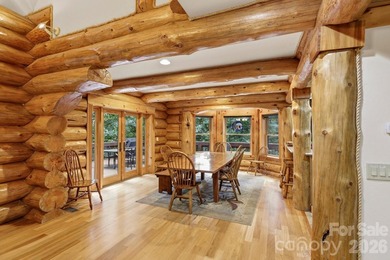 Stunning custom log home nestled on over 3 acres in the shadow - photo 9