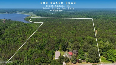 Discover the unmatched potential of this 34-acre wooded paradise - photo 2