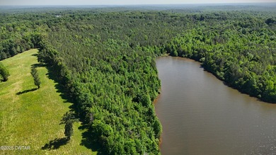 Discover the unmatched potential of this 34-acre wooded paradise - photo 5