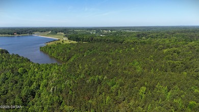 Discover the unmatched potential of this 34-acre wooded paradise - photo 7