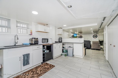 Quiet block, brick home, brand new roof, and a private driveway - photo 8