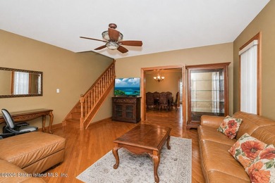 Located at 1879 Haring Street, this full brick end-unit - photo 7