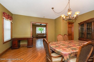 Located at 1879 Haring Street, this full brick end-unit - photo 8