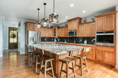 Custom built home meticulously maintained with an abundance of - photo 15
