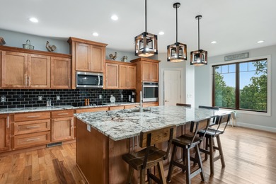 Custom built home meticulously maintained with an abundance of - photo 16