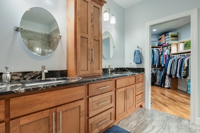 Custom built home meticulously maintained with an abundance of - photo 21