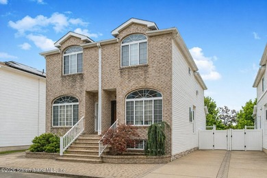 Welcome to this beautifully upgraded semi-attached home in the - photo 3