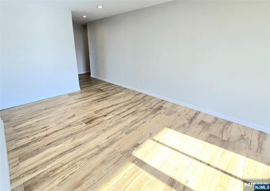 Step inside this Stunning, Custom, Top Floor Corner Unit and