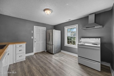 This spacious Carolina Cottage-style home is ideally located in - photo 11