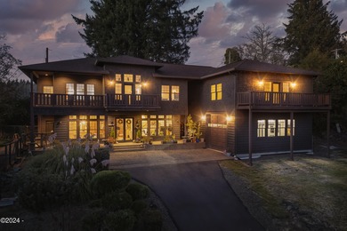 Sophisticated coastal living overlooking Devils Lake, set on a - photo 2