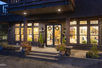 Sophisticated coastal living overlooking Devils Lake, set on a - photo 3