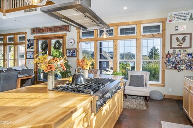 Sophisticated coastal living overlooking Devils Lake, set on a - photo 4