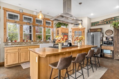 Sophisticated coastal living overlooking Devils Lake, set on a - photo 5