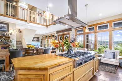 Sophisticated coastal living overlooking Devils Lake, set on a - photo 6