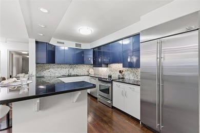 Welcome to this oversized, freshly painted and immaculate condo