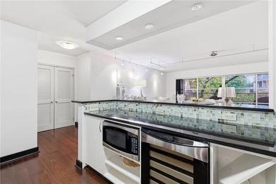 Welcome to this oversized, freshly painted and immaculate condo