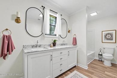 This beautifully remodeled 4- bedroom, 2 -bathroom home in the - photo 18