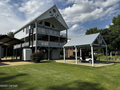 Lake Home For Sale in Crump, Tennessee
