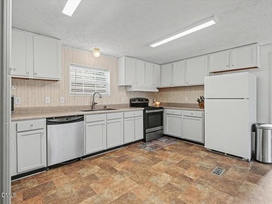 PRICED TO SELL! Enjoy convenient LAKE living just one mile from - photo 12