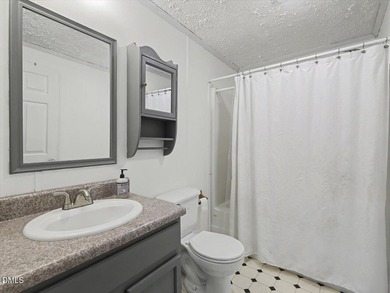 PRICED TO SELL! Enjoy convenient LAKE living just one mile from - photo 22