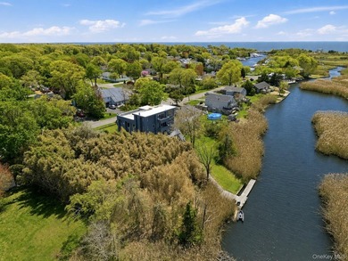 Tucked within the highly sought-after waterfront community of - photo 1