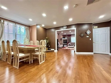 Stunning detached two-family home situated in the highly - photo 3