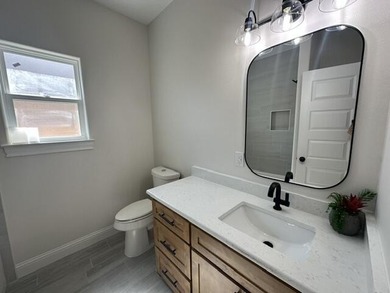 Another stunning creation by Deluxe Custom Homes! This 4-bedroom - photo 11