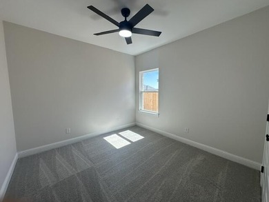 Another stunning creation by Deluxe Custom Homes! This 4-bedroom - photo 15