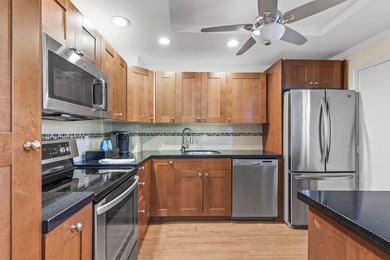 Welcome to this beautifully renovated 2-bedroom, 2-bathroom - photo 1