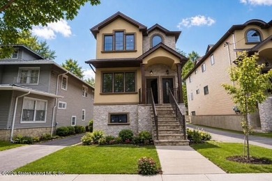 Welcome to this brand-new construction 7-over-7 two-family home - photo 3