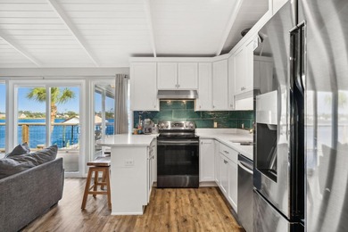 Gorgeous waterfront home that's as close to paradise as you can - photo 8