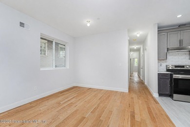 Welcome to this brand-new construction 7-over-7 two-family home - photo 8