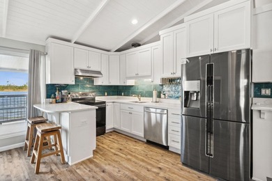 Gorgeous waterfront home that's as close to paradise as you can - photo 9