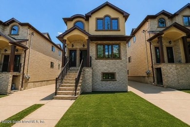Welcome to this brand-new construction 7-over-7 two-family home - photo 1