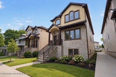 Welcome to this brand-new construction 7-over-7 two-family home - photo 2