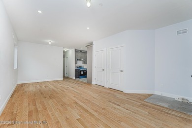 Welcome to this brand-new construction 7-over-7 two-family home - photo 4